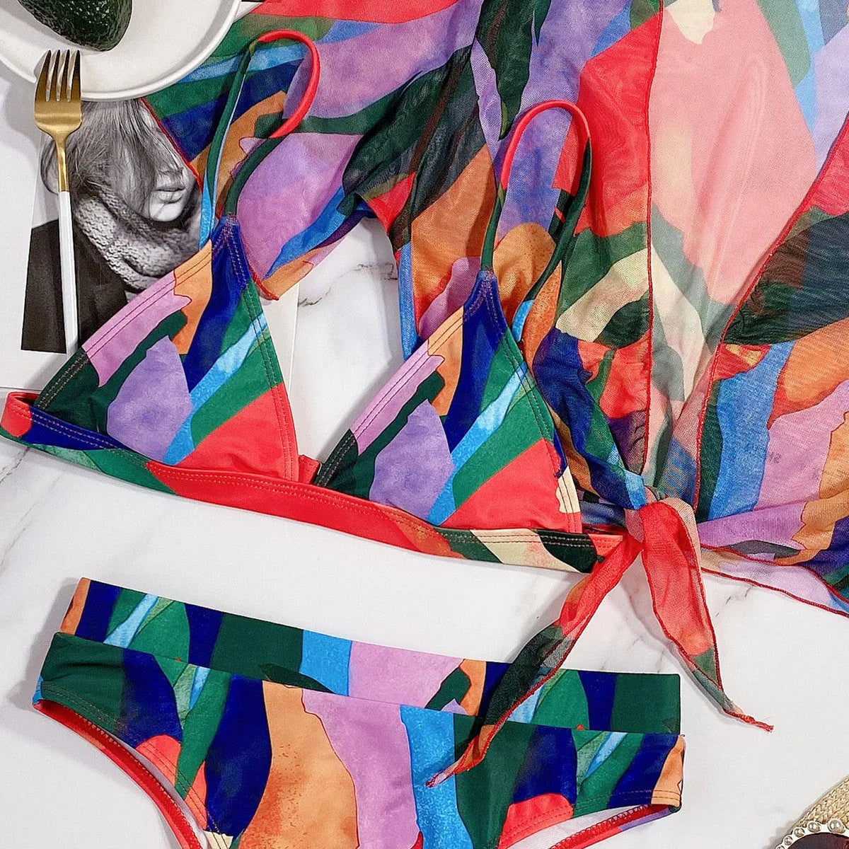 Red women's printed split swimsuit made of nylon for swimming and wading sports.