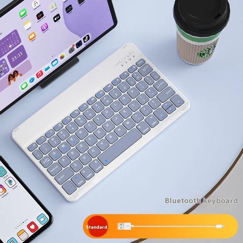 Girls Bluetooth tablet keyboard in colourful ABS design with wireless connectivity for office and home use.