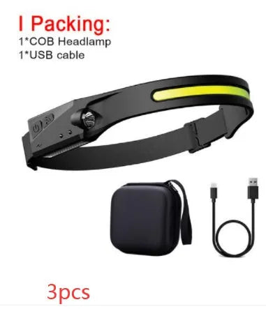Black USB rechargeable headlamp with a wide COB LED lens and a side wave sensor on the headband.
