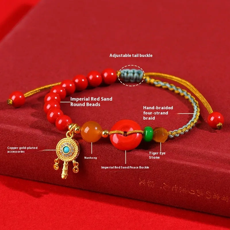 Red cinnabar bracelet with geometric patterns and peace buckle closure
