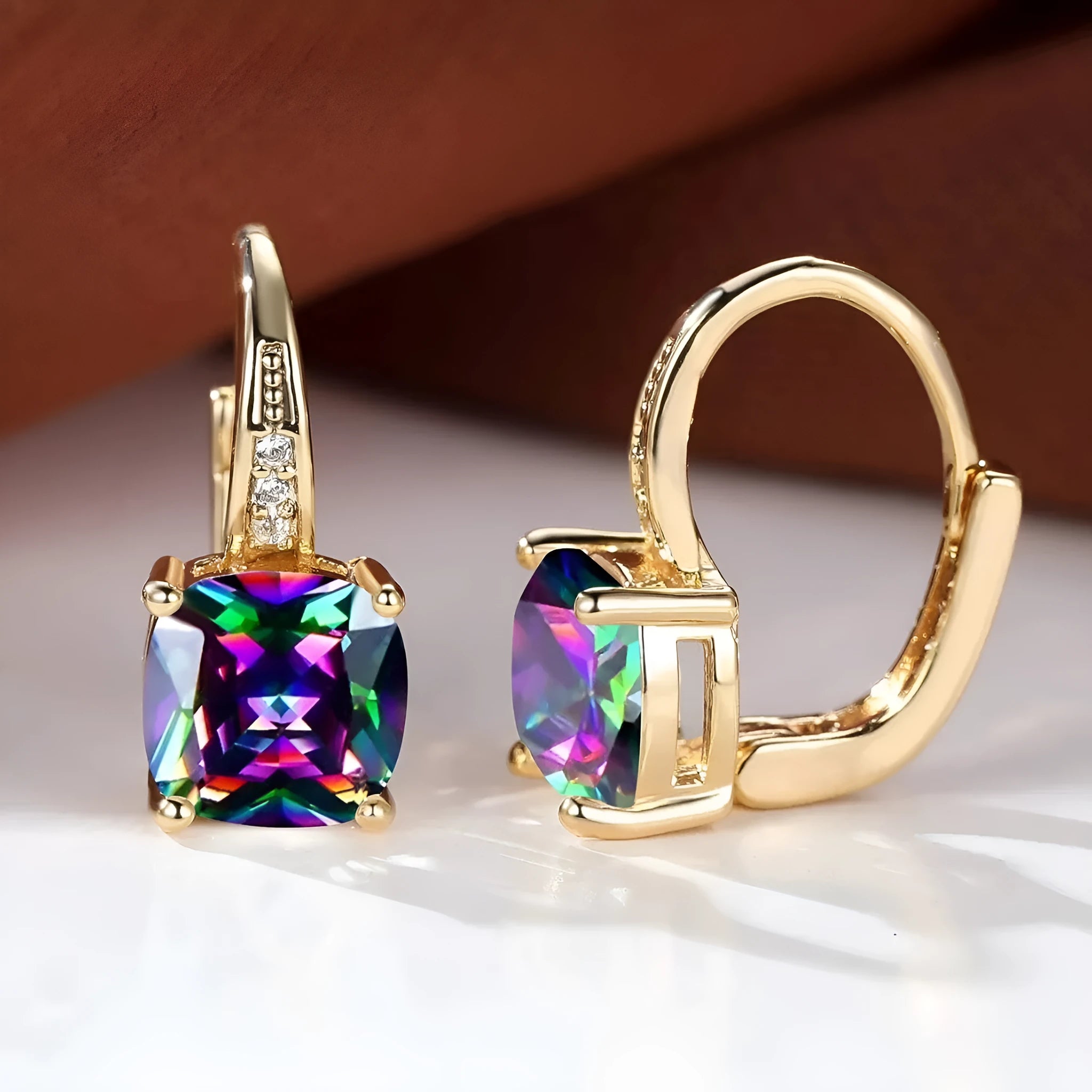 Geometric ear clips with square colourful moissanite inlays and electroplated gold finish