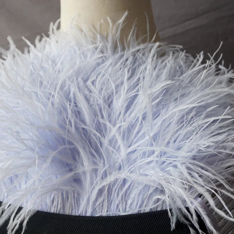 Decorative feather cloth strip in multiple colours including white, black, and mint green for DIY clothing and craft projects