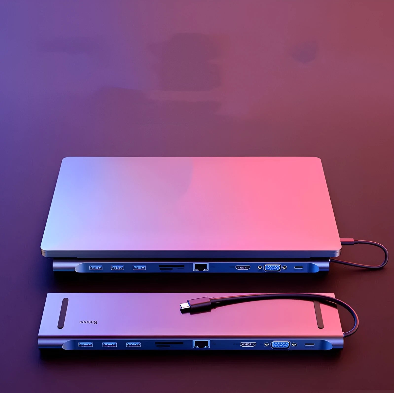 Space grey aluminium alloy ten-in-one USB-C hub adapter with HDMI VGA RJ45 USB 3.0 SD audio and charging ports
