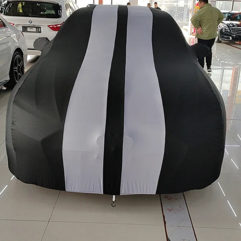 Elastic four-sided car seat cover for Ford Mustang in light grey colour, made from silk polyester fibre.