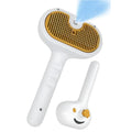 White pet grooming brush with steam spray function and self-cleaning feature for dogs and cats