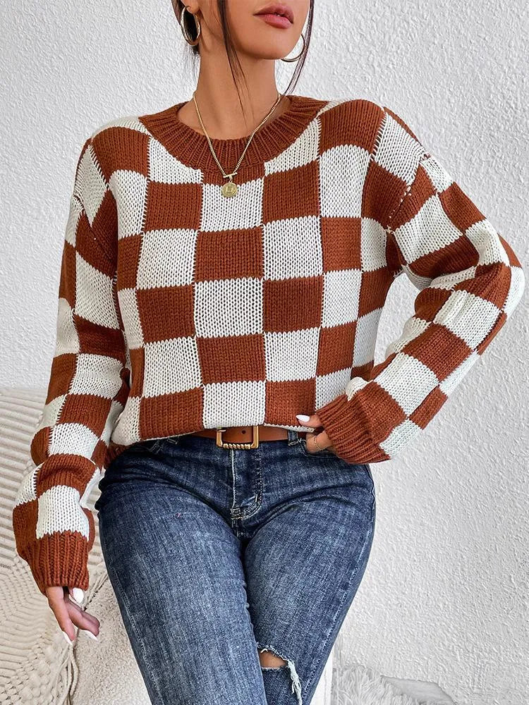 Dark brown plaid pattern acrylic pullover sweater with long sleeves and a loose round neck.