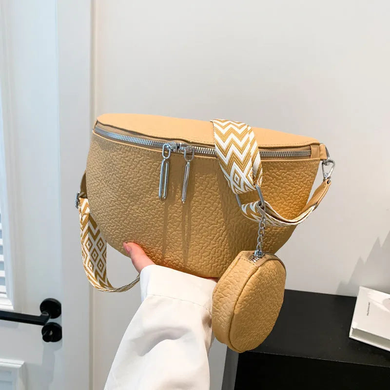 Solid colour women's crossbody bag with textured PU leather and clamshell design
