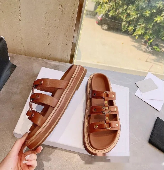 Women's white Roman-style sandal slippers made from glossy patent leather