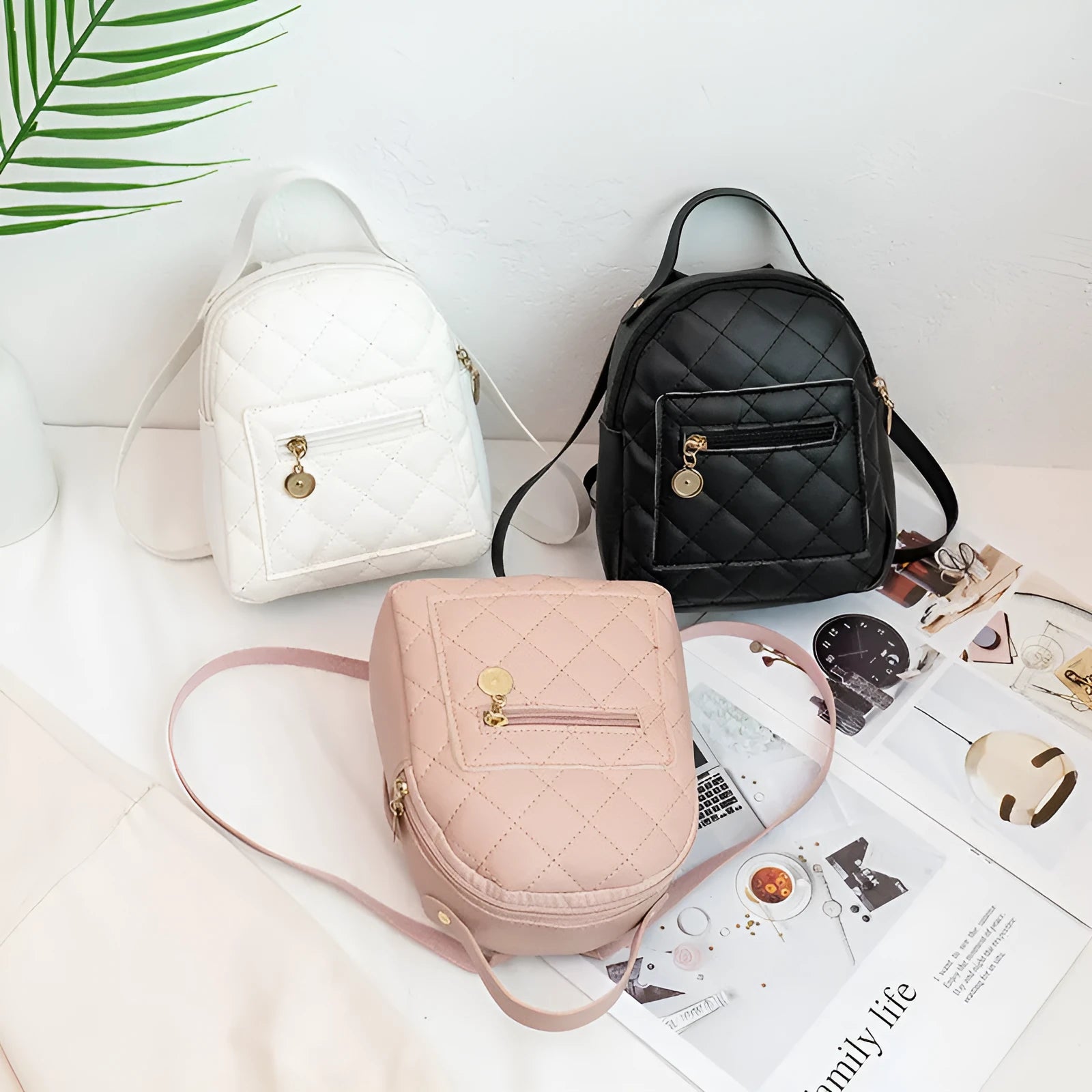 Girls' hard square PU backpack with embroidery in black, white, or pink, showing front and handle.