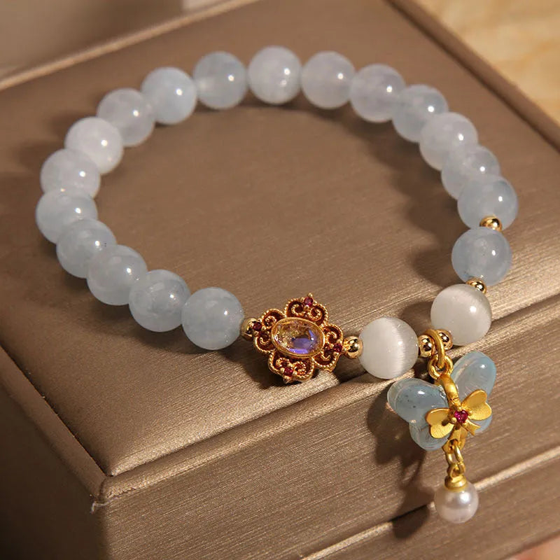 Women's crystal bracelet with butterfly pendant and aquamarine rhinestones