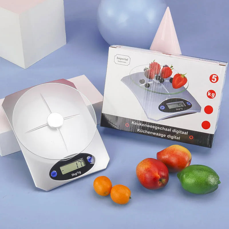 Silver white mini kitchen electronic scale, battery-powered, simple compact design for weighing