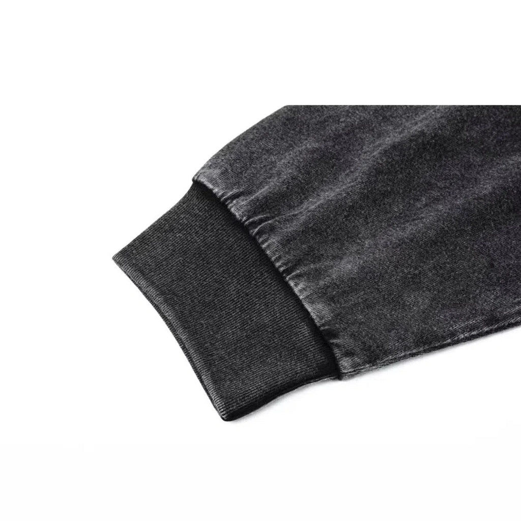 Black pure cotton long-sleeved T-shirt with distressed retro detailing, loose fit and 65cm mid-length.