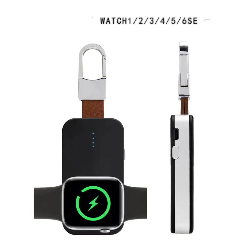 Black Apple Watch keychain power bank with wireless charging pad next to an Apple Watch.