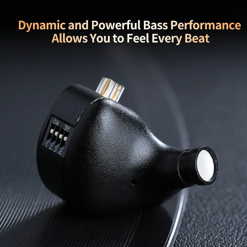 Black wired in-ear monitor earphones with changeable wire, replacement core, tool, cable, manual, and box.