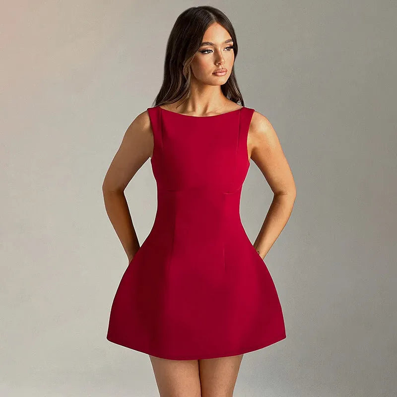 A sling-style backless short summer dress with a high waist, shown in a selected colour.