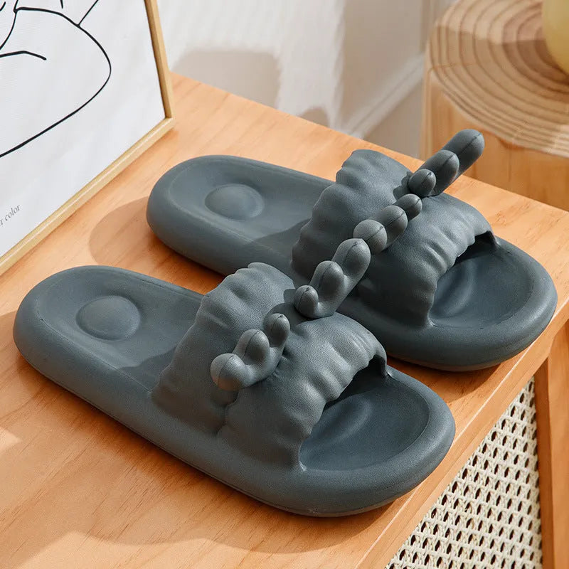 Deer horn design EVA flip flop slippers in light yellow, showing hollow out pattern and non-slip sole.