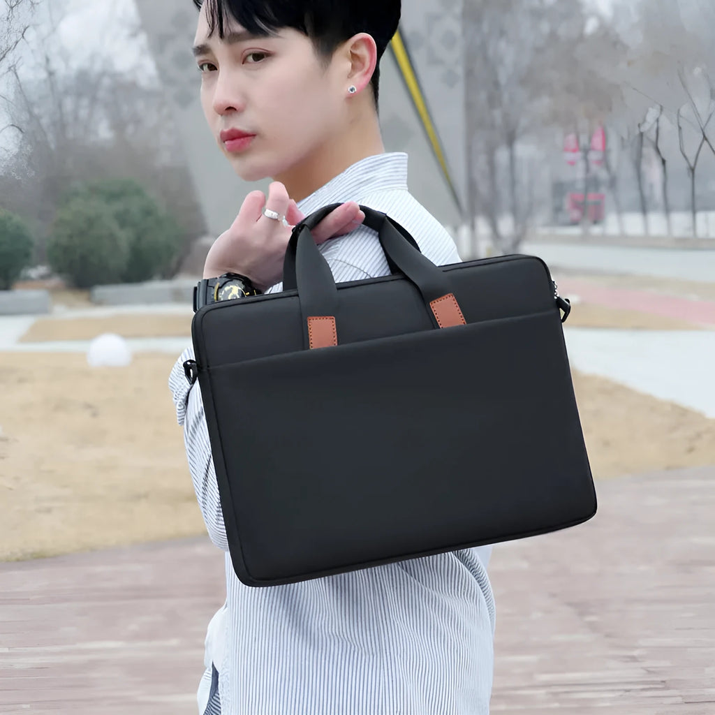 Black one-shoulder Oxford cloth laptop bag with large capacity and padded shoulder strap for 15.6 inch laptops