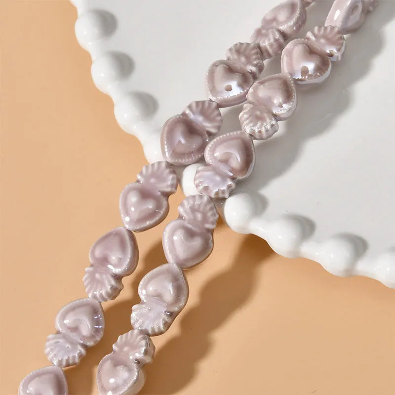 Ceramic love heart small torch beads in multiple colours for jewellery making with straight holes
