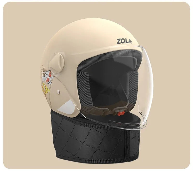 Blown Away winter cycling helmet with attached fleece scarf and clear anti-fog visor on a handlebar.