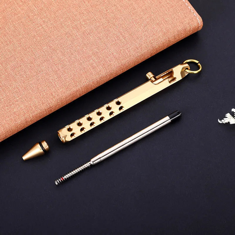 Brass hexagonal bolt-action pen showing six-angle design and bolt mechanism