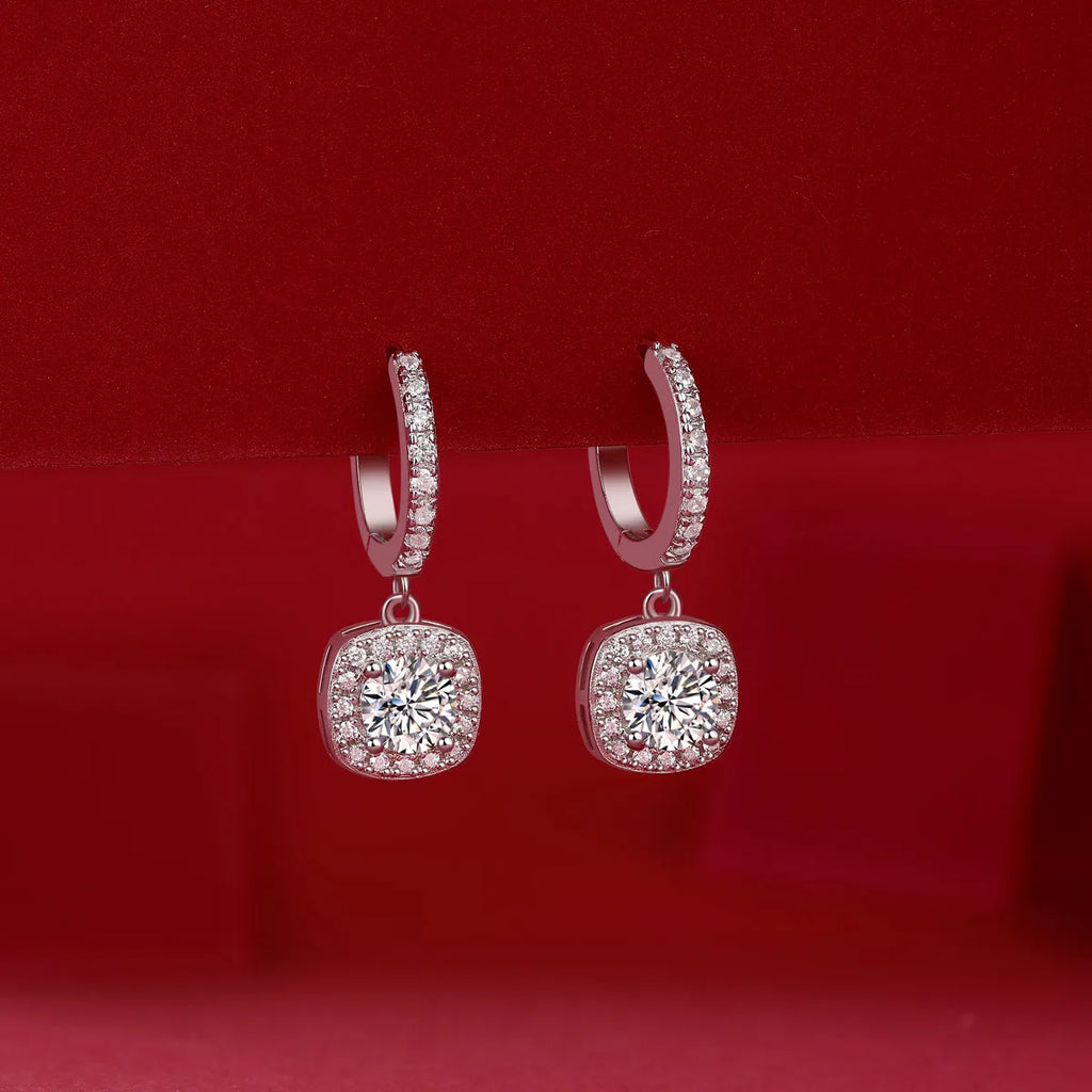 Pair of 0.5-carat total moissanite stud earrings in S925 silver with platinum plating, shown with gift box and GRA certificate