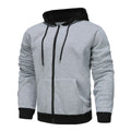 Men's black zip-up hoodie cardigan with a light grey hood on a hanger.