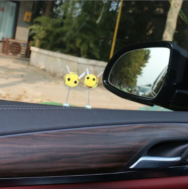 Small fur ball bee car decoration measuring 3cm square with cartoon design