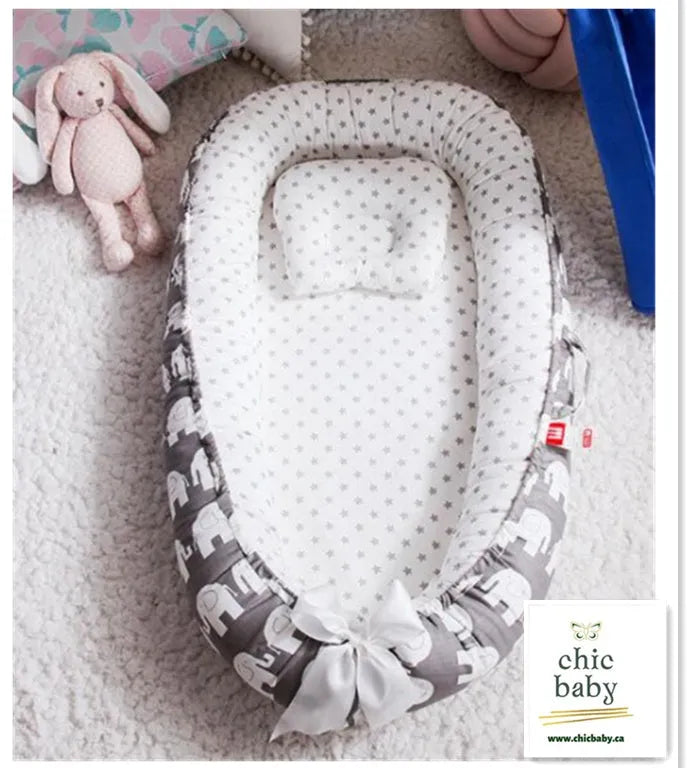 Foldable cotton baby travel crib with removable cover in grey and pink star pattern for infants