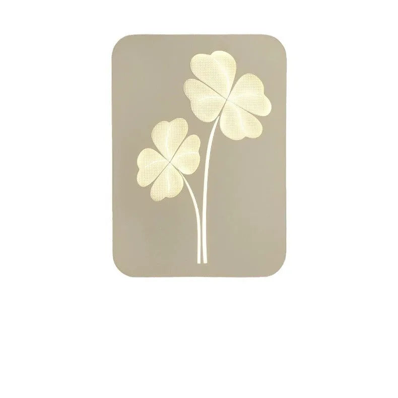 Modern wall lamp with acrylic decorative shade showing tricolour LED lighting and iron construction