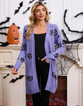 Women's black cardigan with orange pumpkin head jacquard pattern, open front, regular sleeves.