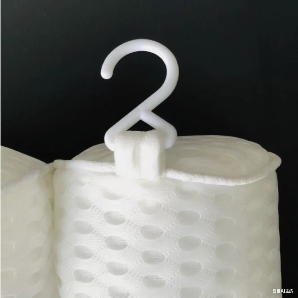 White bathtub pillow with 4D mesh fabric and seven suction cups on a bathtub.