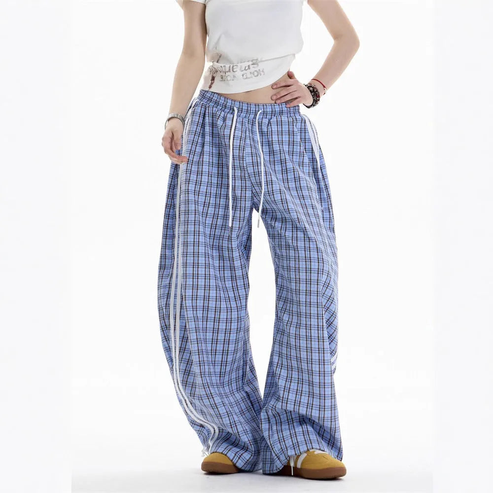 Loose straight drooping wide leg polyester trousers for women with side pockets, available in blue and yellow, sizes S to XXL