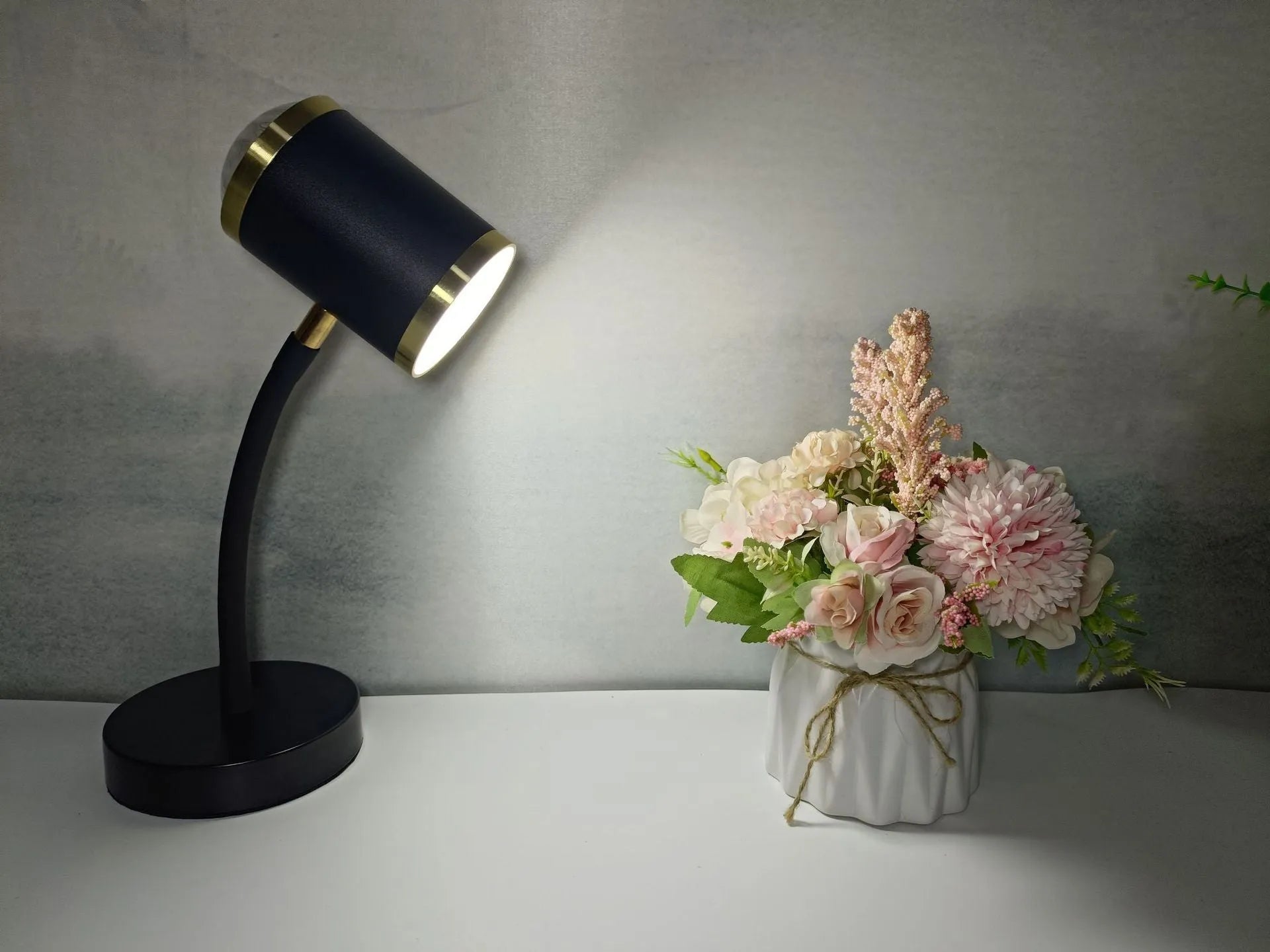 Double-headed black photography lamp with metal base and wired switch for live streaming studio lighting.