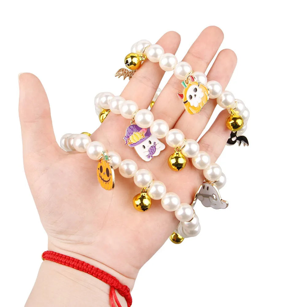 Halloween cat collar with simulated pearl necklace decoration showing three pumpkin design options
