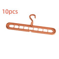 Green plastic multifunctional hanger with nine holes for folded trousers storage