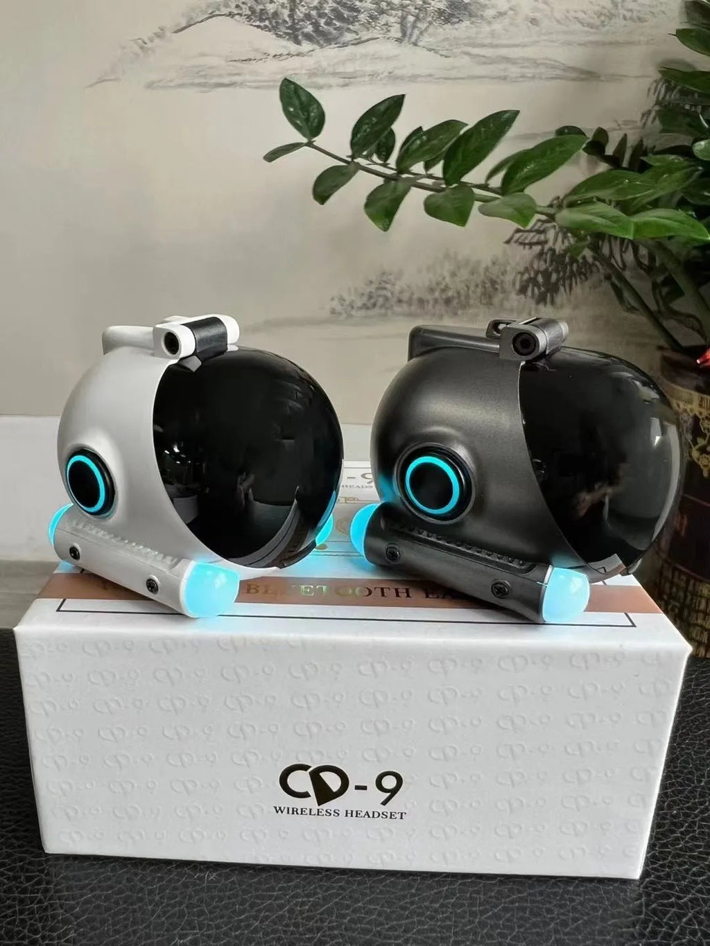 Wireless Bluetooth sports earphones with clip design in black and white colours