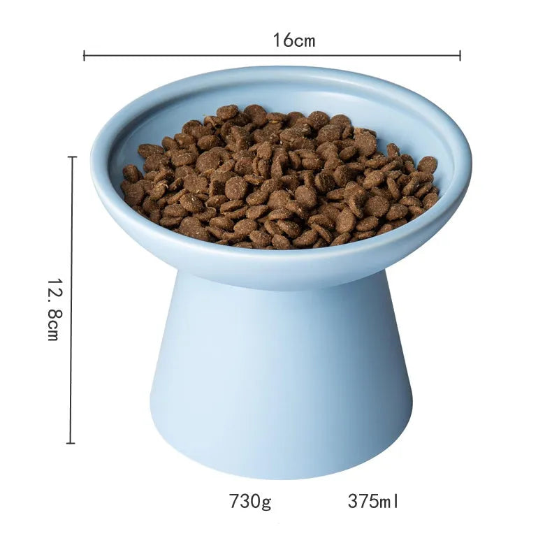 Elevated ceramic cat bowl in blue with wide shallow dish on weighted base