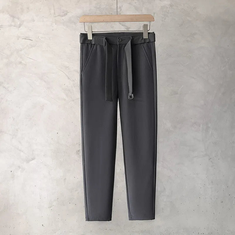 Boys slim straight wool trousers in tapered fit, shown in light grey colour.
