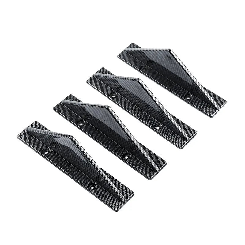 Black triangular car rear spoiler on a white background, shown with screws and adhesive tape.