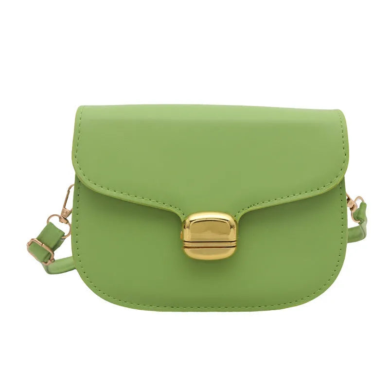 Simple PU leather women's handbag showing interior zipper coin compartment and phone pocket.