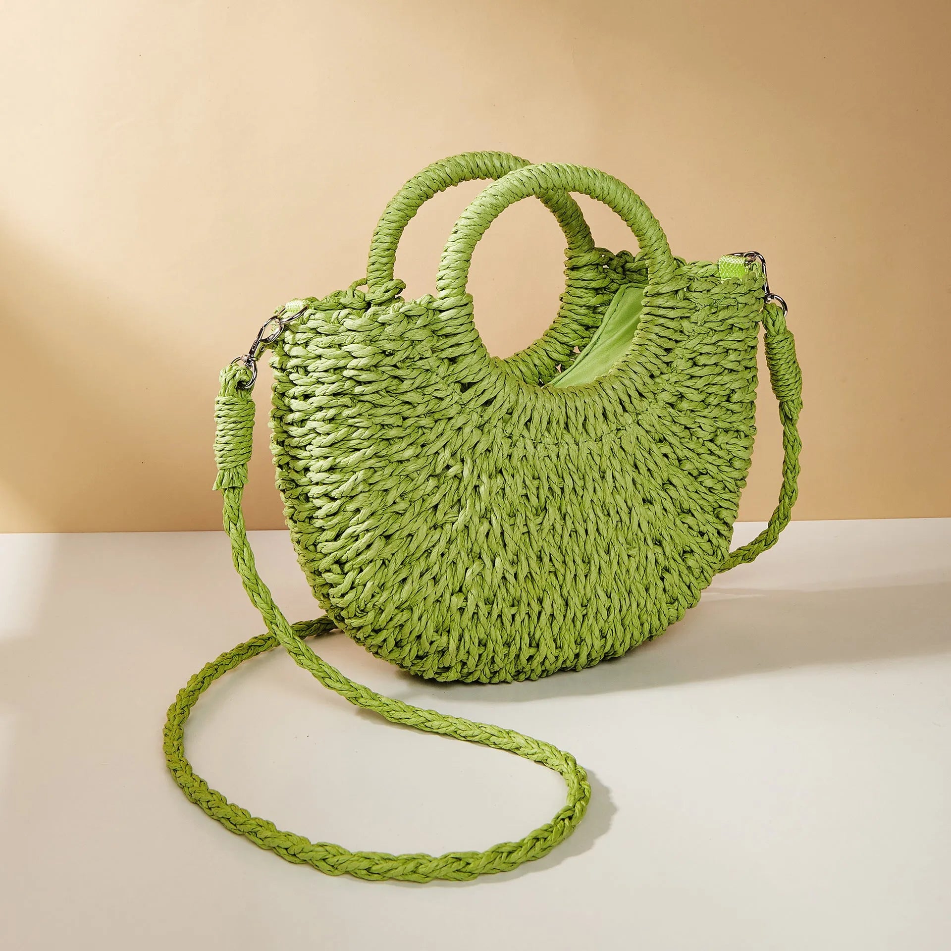 Woven straw crossbody beach bag in beige, 24cm height, peach skin lining, six colour options
