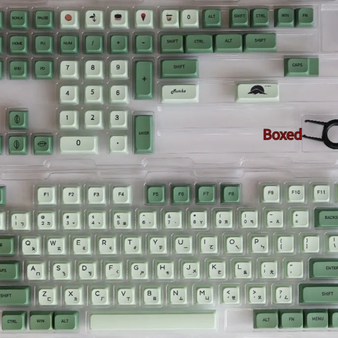 124 PBT dye-sublimation keycap set in matcha green colour on a keyboard.
