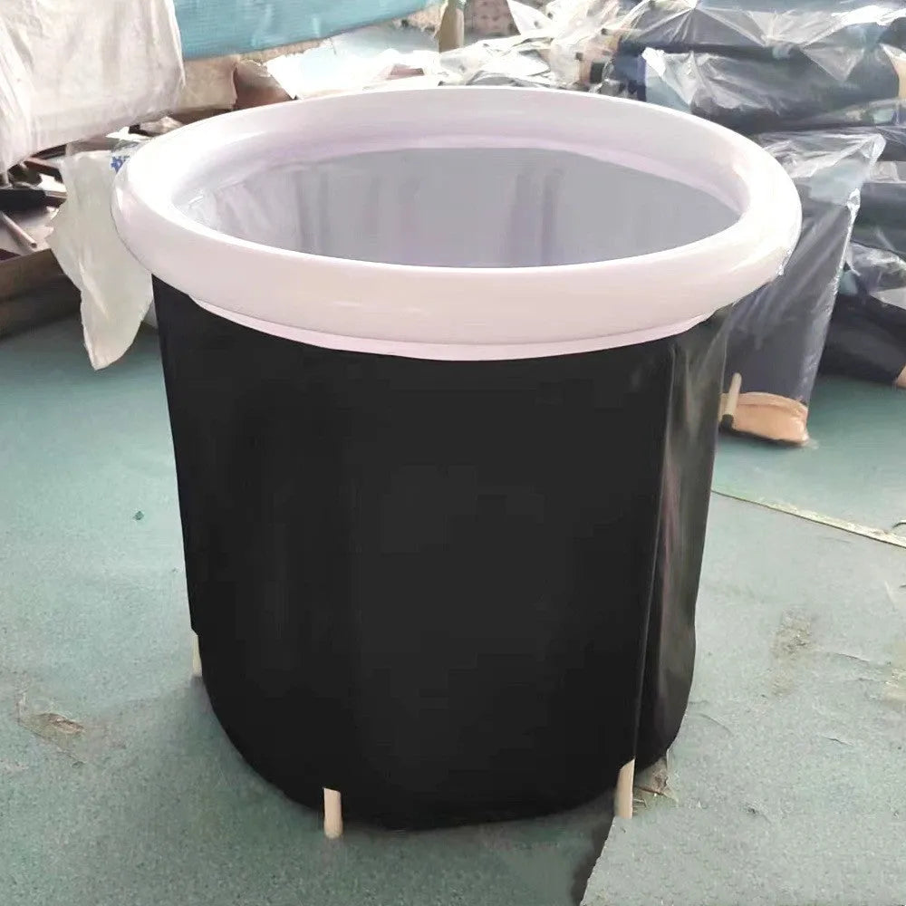 Black portable inflatable ice bath with weather lid for cold therapy recovery