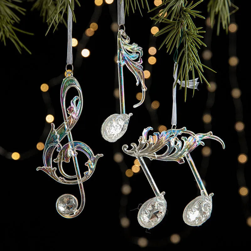 Transparent acrylic and plastic Christmas hanging decorations in snowflake, elk, icicle, and garland designs.