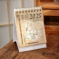 Four mini paper desk calendars for 2025 with different motivational themes in simple modern design
