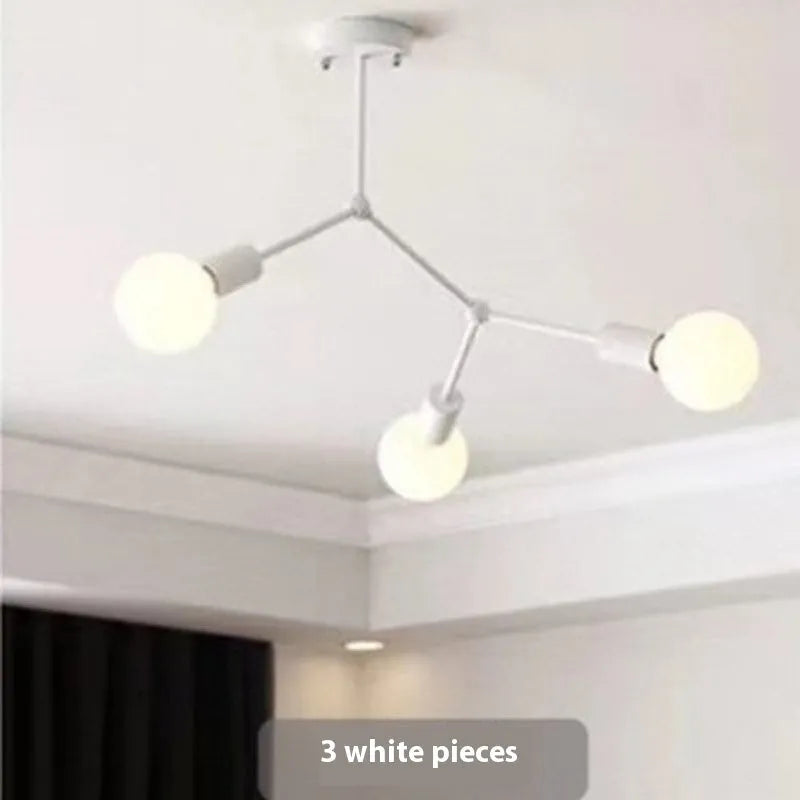 Minimalist black iron ceiling chandelier with six light heads in a Nordic style, against a white background.