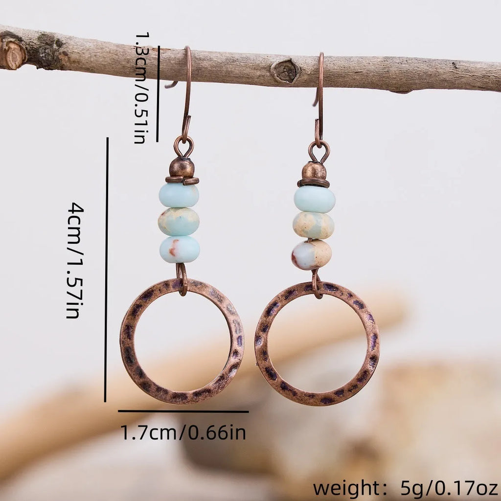 Women's hammered turquoise beaded pendant earrings in creative retro style with zinc alloy construction