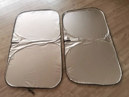 Titanium silver aluminium foil car sunshade folded, showing reflective surface and size options.