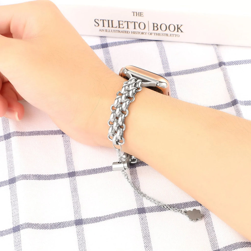 Stainless steel double row chain watch band for Apple Watch in silver on sport-style background