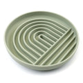 Silicone dog slow feeder bowl with ridges and nooks, shown in beige colour